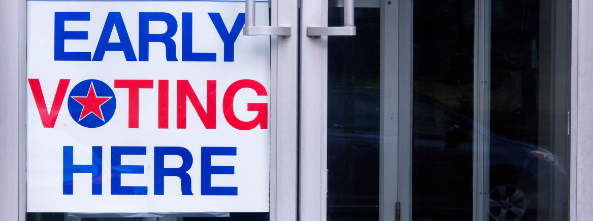 Early Voting An early voting sign on a storefront door.